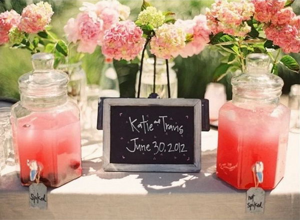 Pretty pink beverage station. I really appreciate this pink beverage station for its table, the exquisite labels, the fresh flowers and the rosy drink for a sweet, romantic style.