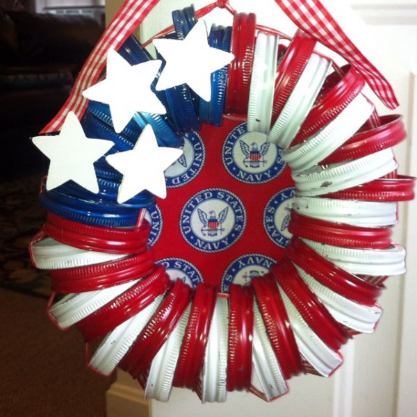 Patriotic mason jar lid wreath. Take leftover mason jar lids, paint them in red, white and blue, wrap them in a rope and create adorable wreath decorations. Super easy and quick - perfect for kids and fun to embellish. 