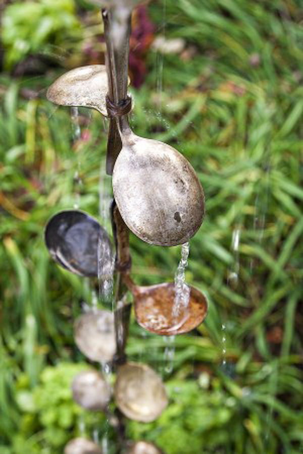 Rain chain from salvaged spoons. Not only do you make a good sound and improve the external appearance of your home, but you also channel water away from your home.