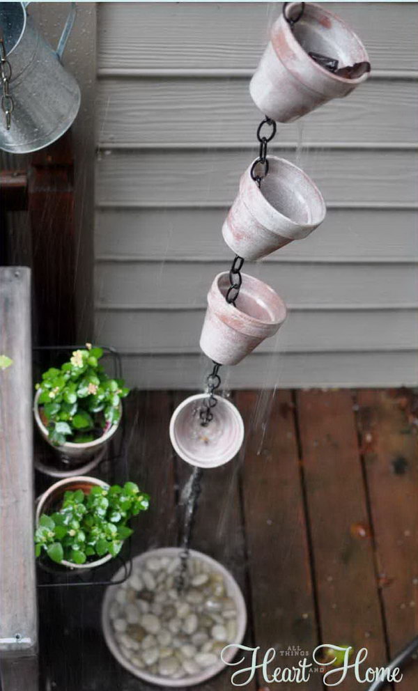 Adorable painted flowerpot rain chain. Not only do you make a good sound and improve the external appearance of your home, but you also channel water away from your home.