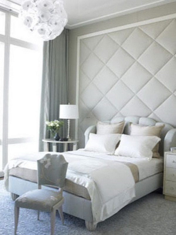 Set a focus with floor-to-ceiling headboards. 