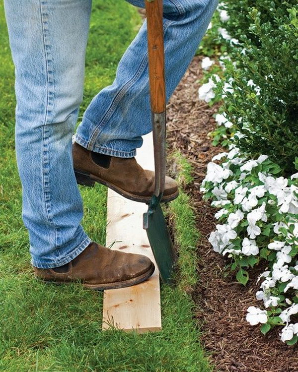 Use a modest plank of any size to easily edge a lawn 