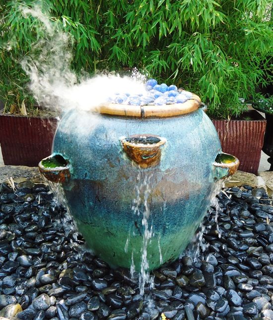 Strawberry pot turned fountain. 