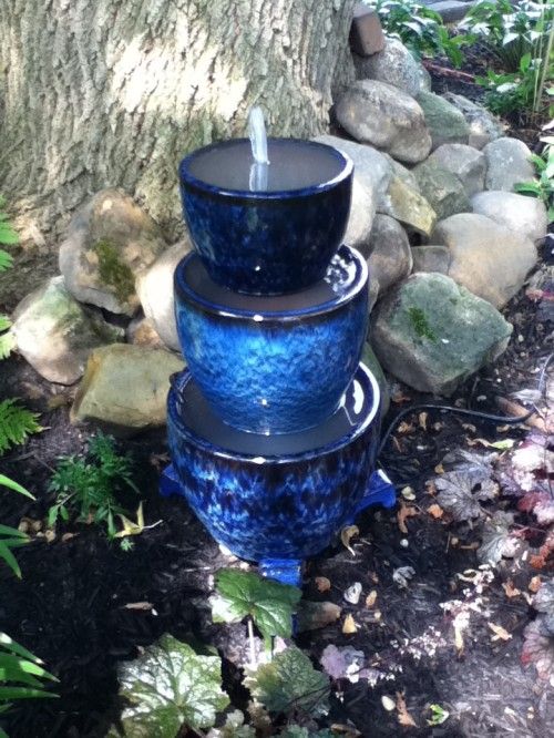DIY Tiered Blue Planters fountain. 