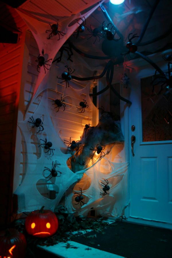 Spooky Front Porch Decor with Discount Store Spider Webs and Spiders. 