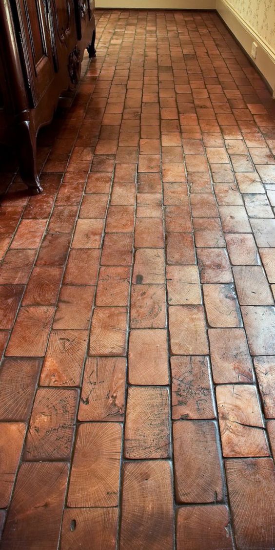 Wood block floors show final grain like an old factory floor. 