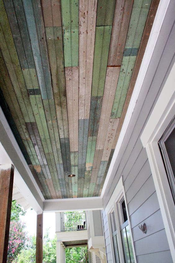 Install the salvaged pearl board on the porch ceiling. 