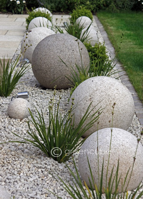 Create landscaping with concrete decorative balls. 