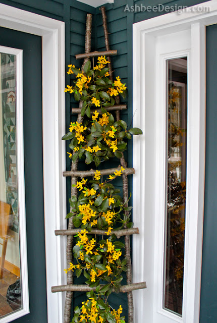 Decorate the porch with DIY birch ladder. 