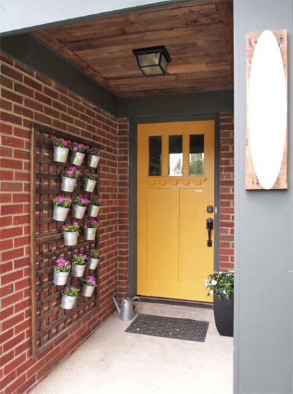 Decorate the veranda with this DIY Vertical Wall Planter. 