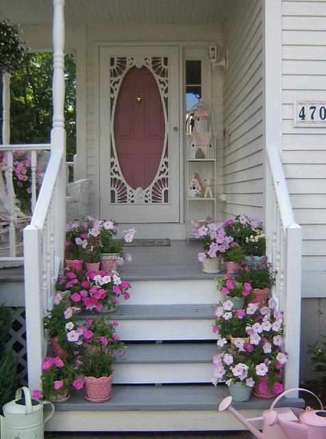 Display potted flowers on your porch levels. 