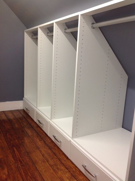 Build a built-in closet with hanging bars and storage space below. 