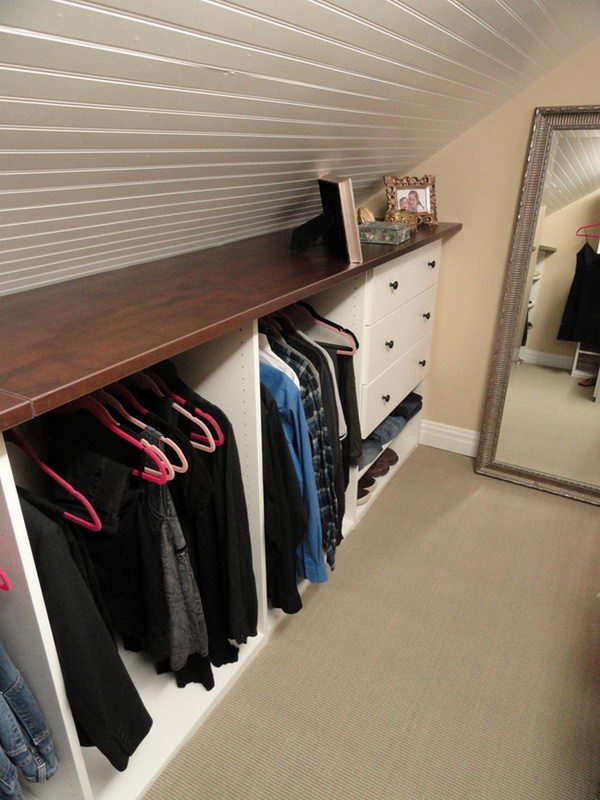 Build a roof cabinet with shelves and drawer in the lower part at the end of the system. 