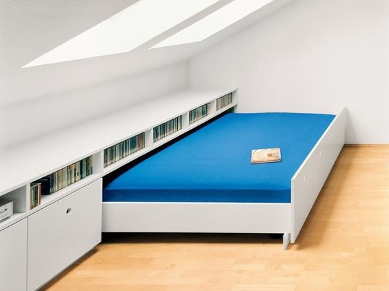 Create a guest room in the attic with storage space and pull out the bed. 