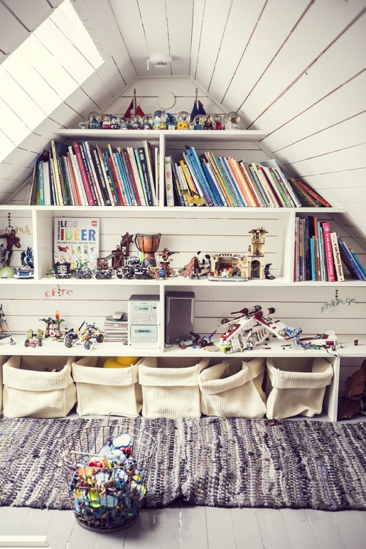 Create a wall library to store and view your child's books on the top floor. 
