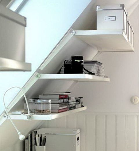 Use storage racks on the sloping wall for loft house. 