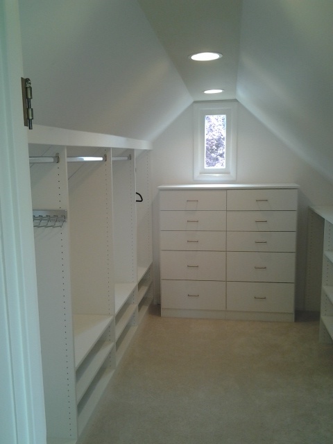 Add a small chest of drawers in the walk-in closet. 