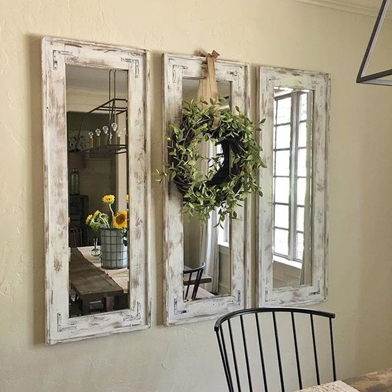 Rustic do-it-yourself wall mirrors made of plywood and cheap frameless mirrors. 