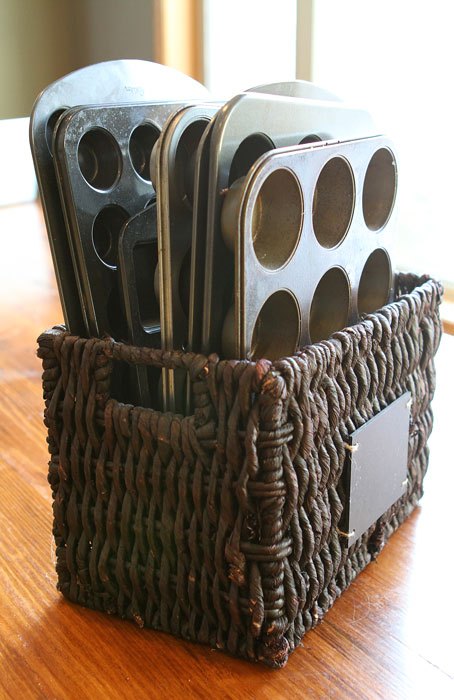 Magazine basket for cupcake pans. 