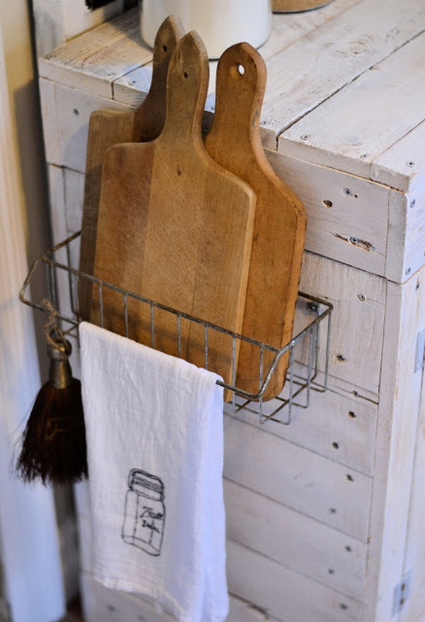 Hanging wire basket for storing the cutting boards. 