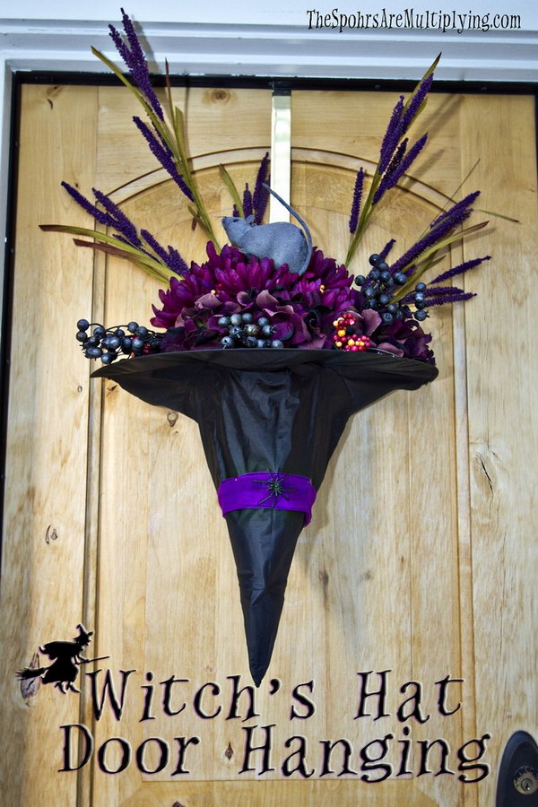 DIY witch hat hanging on door. 