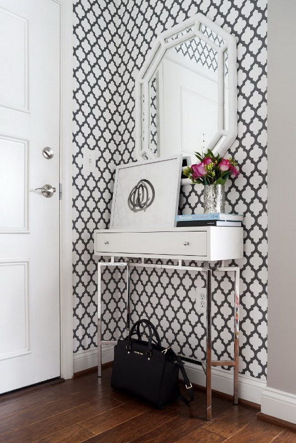 Adding a graphic background image gives a dimension to a small entrance area. 