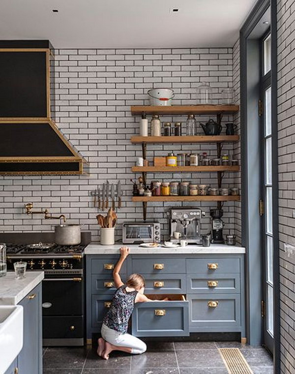 Black Rangehood and the Charcoal Grout on the subway tiled kitchen back wall 