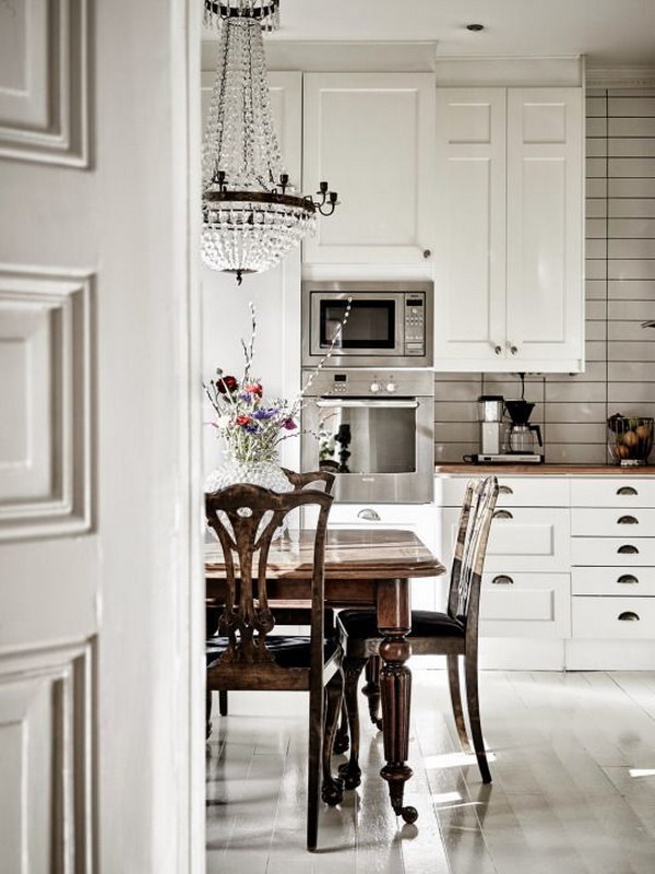 White Subway Tile Backsplash and Black Grout in a classic kitchen in white, gray and black 
