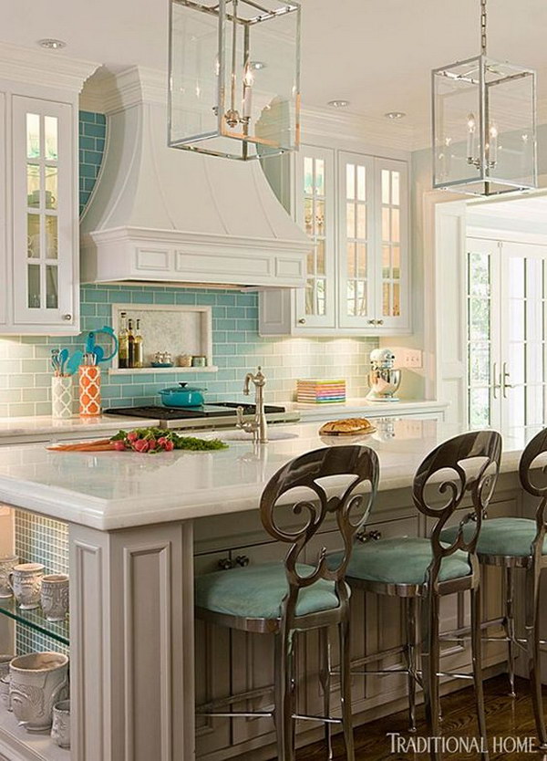 A touch of color: white furniture with light turquoise tile backsplash 