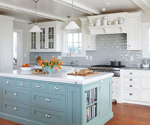 Blue Island Enlivens the gray backsplash of the subway tiles and white cabinets 