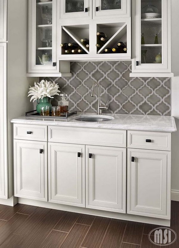 Gray Arabesque Shape Mosaic Tile Backsplash against white cabinets