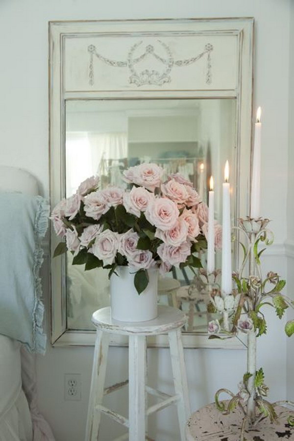 Shabby chic decoration with flowers and mirrors 