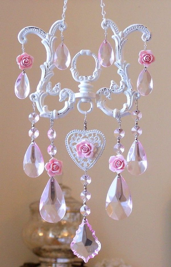 DIY sun catcher made of chandelier parts and porcelain roses 