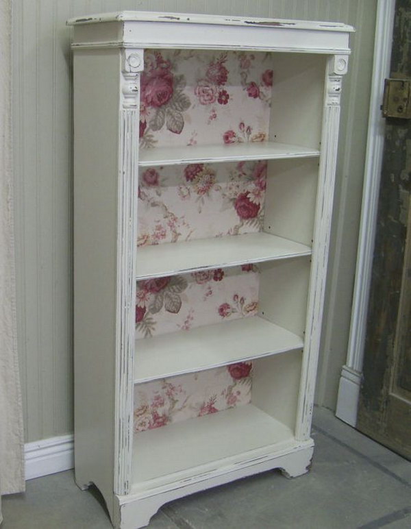 Take a simple bookshelf and shabby it with wallpaper and details 