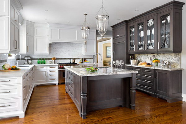 Dark brown and white two-tone kitchen cabinets with an extended island. 