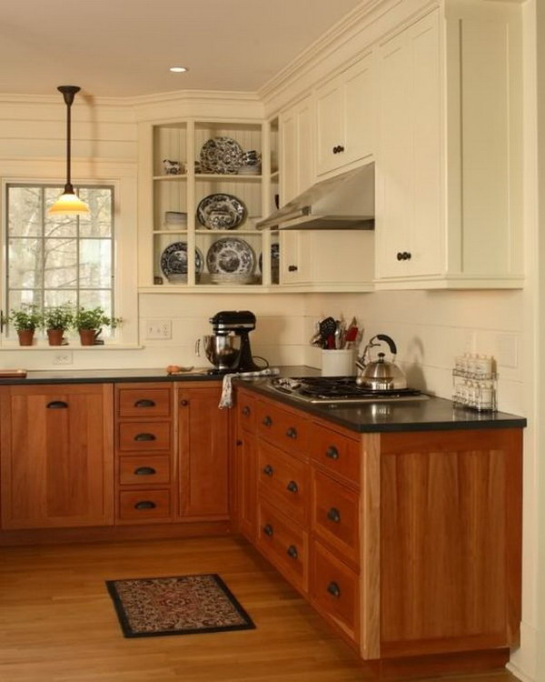 Cream-colored and warm wooden kitchen cabinets. 
