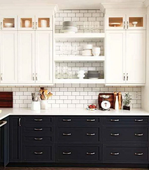 Whitewashed and dark gray two-tone kitchen cabinets. 