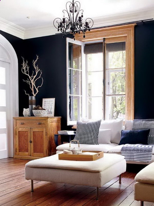 Living room with black paint walls. 