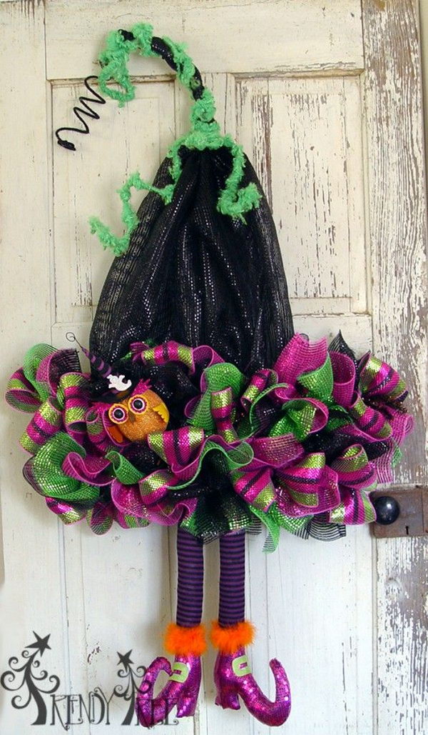 Deco poly mesh witch hat with legs. 