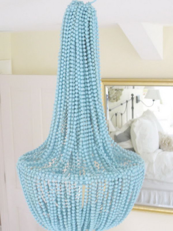 DIY pearl chandelier with gold pearls. 