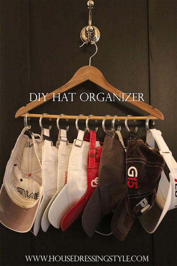 DIY hat holder with curtain rings and a hanger