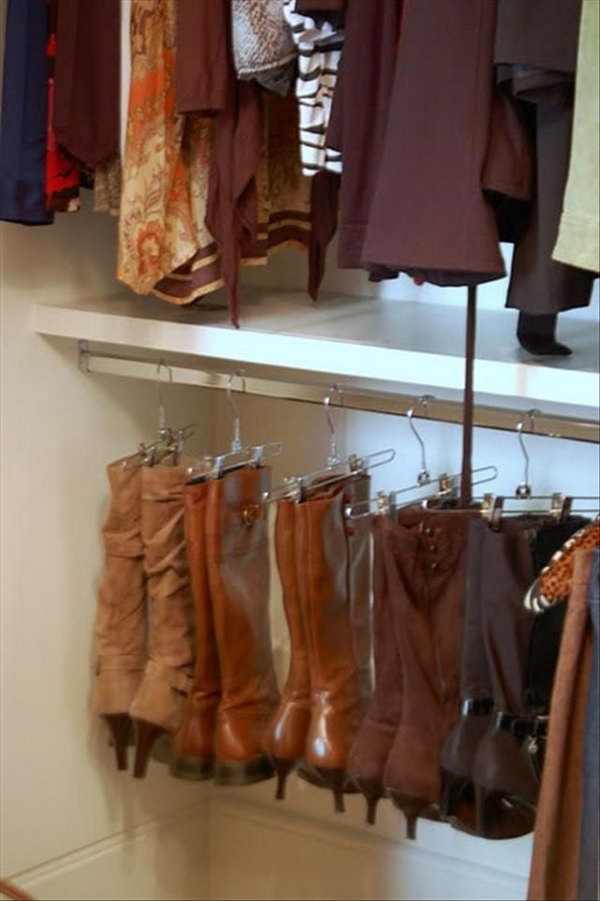 Use pant hangers to organize your boots