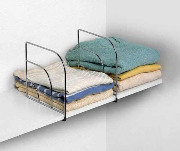     Store clothes with shelf dividers on shelves more efficiently