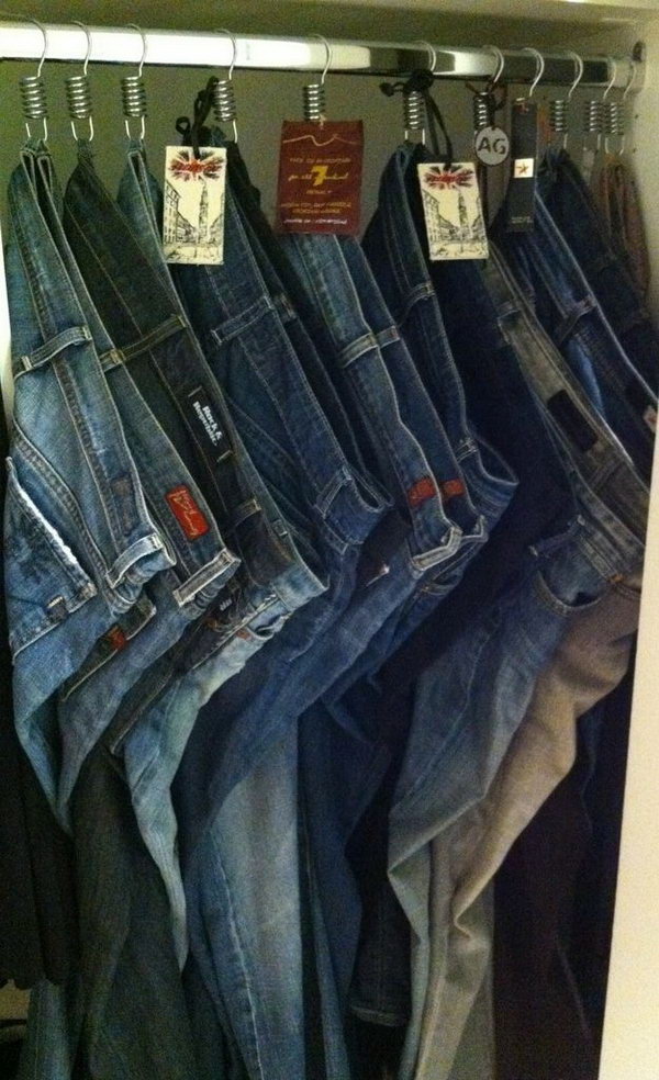 Hang your jeans on shower hooks on the belt loops