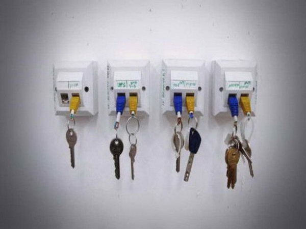 Geeky USB cable key holder. This key holder consists of several wall-mounted RJ-45 socket network boxes. It's fast and awesome, and most importantly, all of your keys are right where you left them. Get more inspiration  