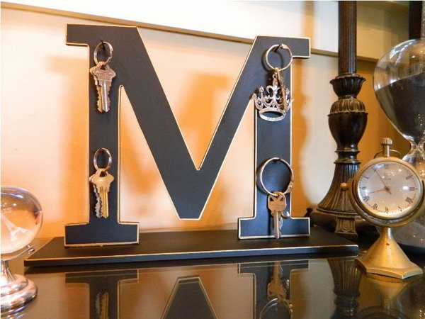 Monogram key holder. This project not only serves as a functional key holder, but also as a chic and beautiful home accessory. Check out 
