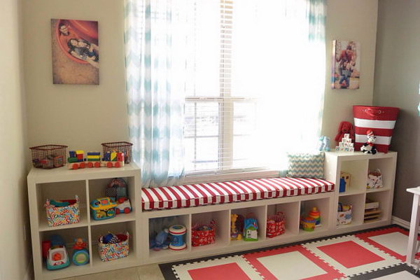 Ikea Kallax Hack: storage in the playroom. Personalize your space by combining different Kallax shelves like this and adding a custom pillow above to achieve a complete look in your room.