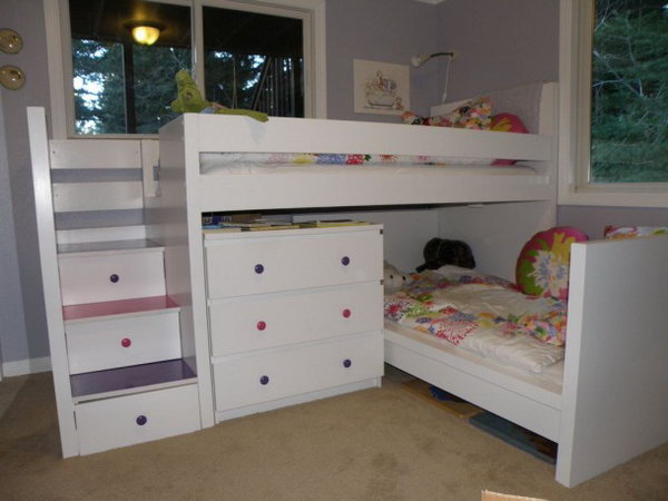 Malm toddler bed under a Malm-inspired bunk bed: This bunk bed was made with two used Malm beds and a used Malm chest of drawers. I appreciated that it was done so nicely with so much storage space and the stair drawers are perfect for kids who love climbing. See the details   