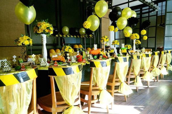 Construction Party Decoration: Check out the fantastic tie-chair ties and the yellow and black balloons, they are so fitting and fun for the building theme. 