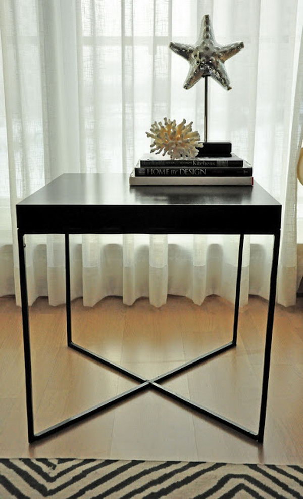 Modern welded table. This creative welded table consists of the wooden top of an IKEA LACK table and the X-shaped metal frame as the table leg. It's just chic and perfect for any room in your home. more details 